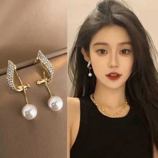 Pearl earrings Joker pendant