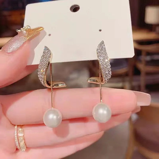 Pearl earrings Joker pendant